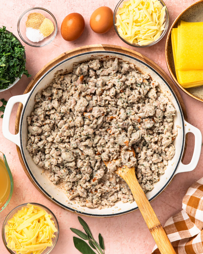 Chicken sausage meat cooked in a pan.
